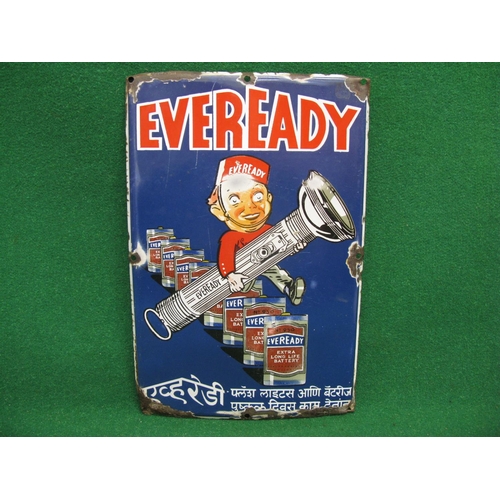 125 - Eveready enamel sign featuring an Eveready boy striding forth with his Eveready torch over a row of ... 