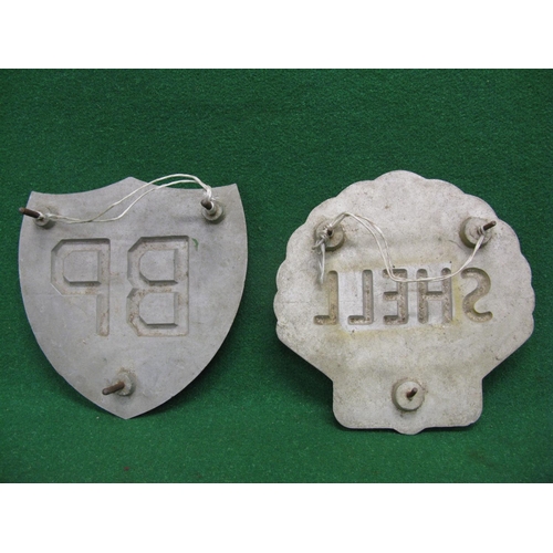 127 - Two embossed cast aluminium pump plaques for Shell and BP with three threaded fixings to the rear - ... 