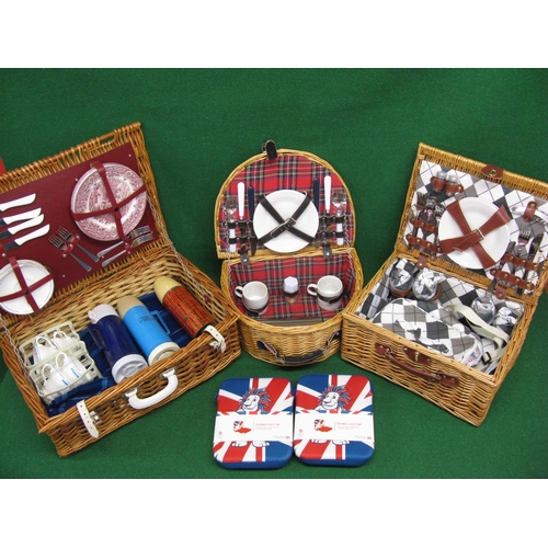 13 - Three different wicker picnic hampers with contents together with two Team GB insulated lunch box se... 