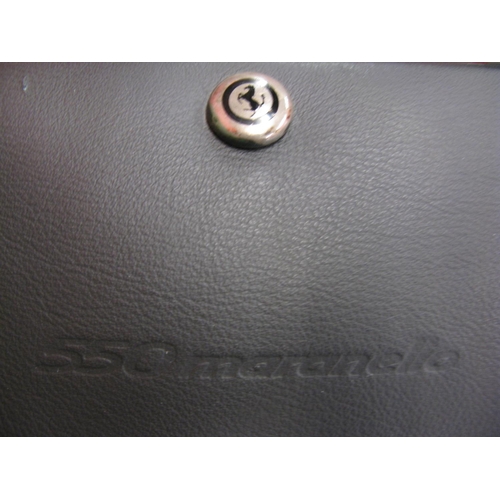 14 - Two fitted suit cases from a 1996 Ferrari 550 Maranello.  Cases and interior buckles are branded Fer... 