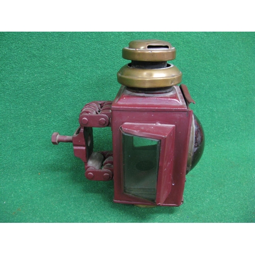 40 - Dependence paraffin lamp with red convex front lens and clear glass side panels made by J&R Oldfield... 