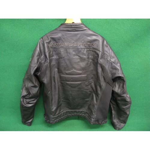 68 - 2005 Harley-Davidson leather motorcycle jacket Part No. 97005-06VM with decals on arms, zip fob and ... 