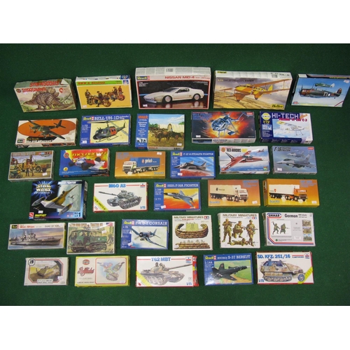 284 - Approx thirty two boxed plastic kits or soldiers etc for a variety of subjects by Airfix, Revell, Em... 