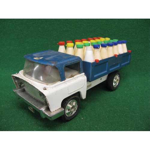 288 - Triang tinplate Hiway milk truck with a full complement of bottles - 13'' long (one lid missing)