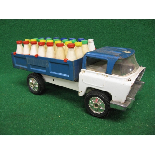 288 - Triang tinplate Hiway milk truck with a full complement of bottles - 13'' long (one lid missing)