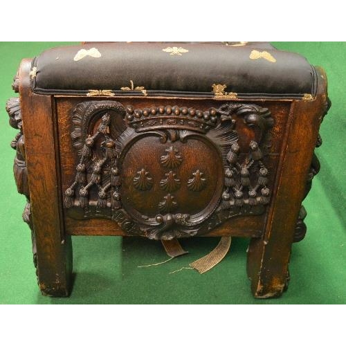 109 - Oak carved day bed having carved decoration of cherubs riding sea serpents, further cherub carvings ... 