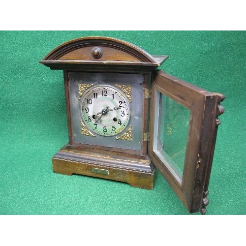 202 - Mahogany cased mantle clock having silvered dial with black numerals and black metal hands, standing... 