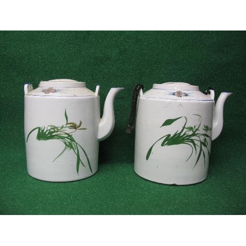 211 - Pair of large Oriental teapots having floral decoration with birds and cord handle (one handle missi... 