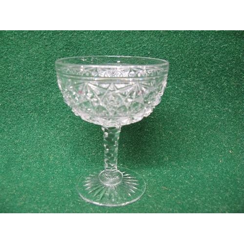 224 - Set of ten Tudor Crystal champagne coupes having cut decorated bowls supported on cut stems and star... 