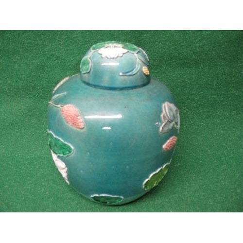 245 - 20th century Chinese blue/green glazed jar and cover decorated with crane and lotus the base having ... 