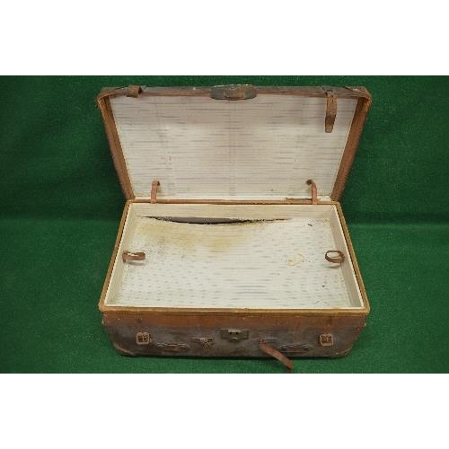 253 - Leather travelling trunk opening to reveal original lift out tray (in af condition) having side carr... 