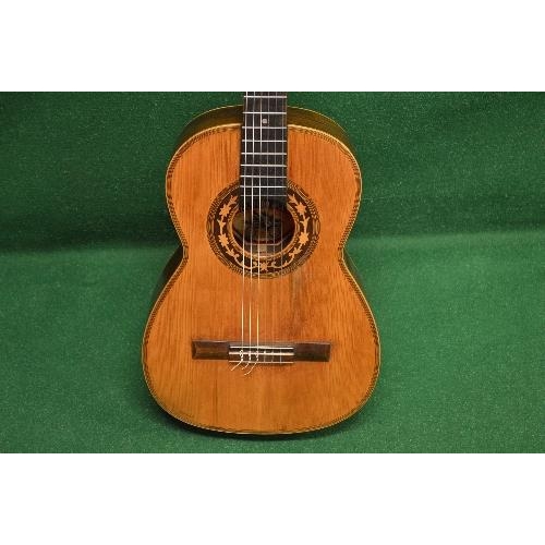 263 - A circa 1890 Telsford Julve guitar with hard case