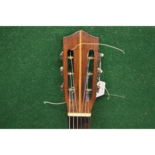 263 - A circa 1890 Telsford Julve guitar with hard case