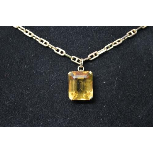 345 - Gold and Citrine single stone pendant, claw set with a cut cornered rectangular step cut Citrine, 9c... 