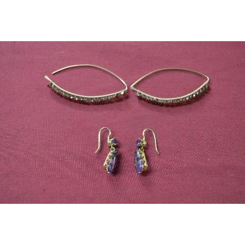 355 - Pair of gold and Amethyst pendant earrings, each claw set with a pear shaped Amethyst to the drop an... 