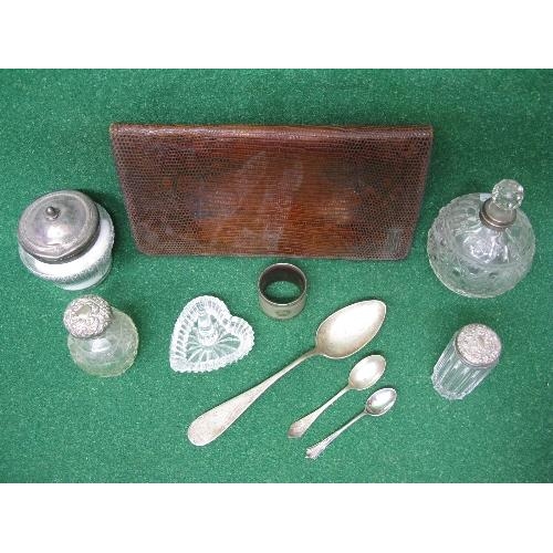 386 - Group of silver items to comprise: two silver topped pots, two silver topped scent bottles, napkin r... 