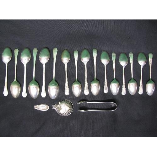 393 - Quantity of silver tea spoons together with a pair of silver sugar tongs