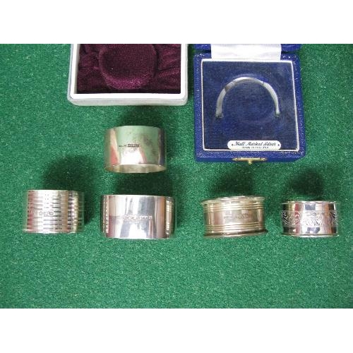 395 - Group of five various silver napkin rings