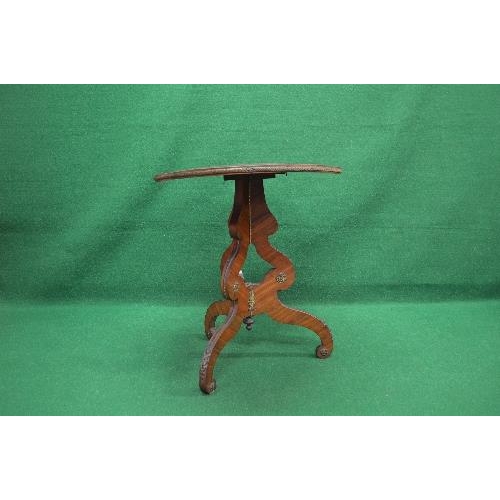 67 - Marquetry inlaid topped shaped tip top occasional table supported on a triform upright leading to do... 