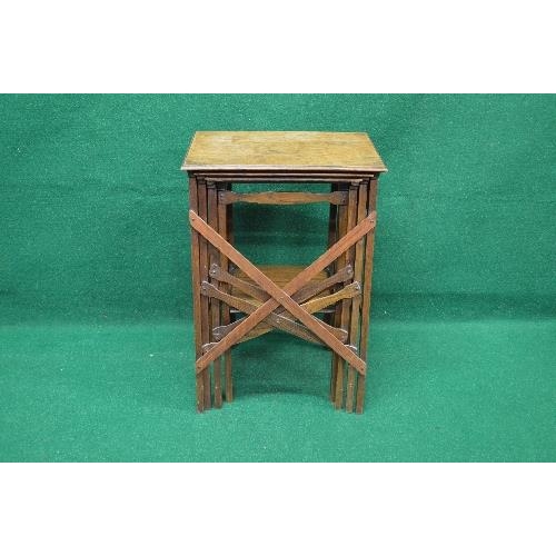 72 - Nest of four oak Arts & Crafts occasional tables the smallest having a second tier - 16.25