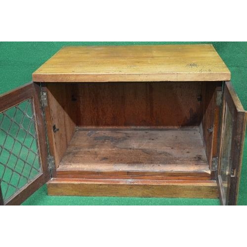 79 - Mahogany glazed two door cabinet standing on a plinth base - 28