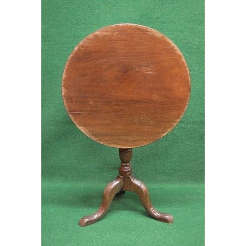 82 - Mahogany circular tip top occasional table, the top supported by a turned column leading to three ca... 