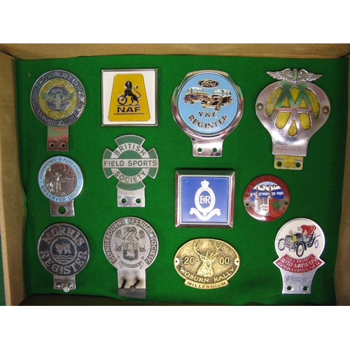 137 - Eleven car badges and brass rally plaque to include: Ithom Valley Motor Club-Llandrindod Wells, Roya... 