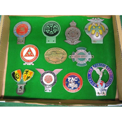 138 - Ten car badges and brass rally plaque to include: Royal Air Forces Association, Orkney Vintage Club,... 