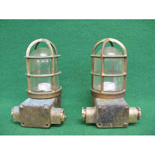 173 - Pair of brass bulk head lights with three fixing lugs and domed glasses - 9.5