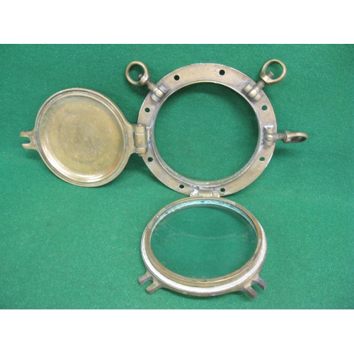 176 - Double hinged heavy brass and glass porthole with cover, stamped 6 - max dia of mounting 14.5