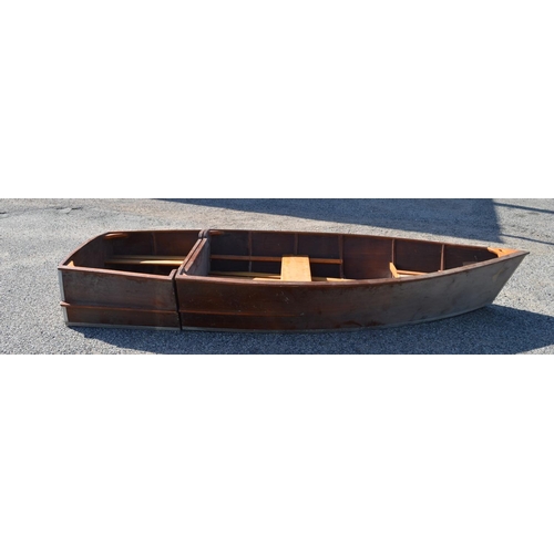 254 - An all wood portable dinghy in two parts, the larger bow section goes on the roof rack, the stern in... 