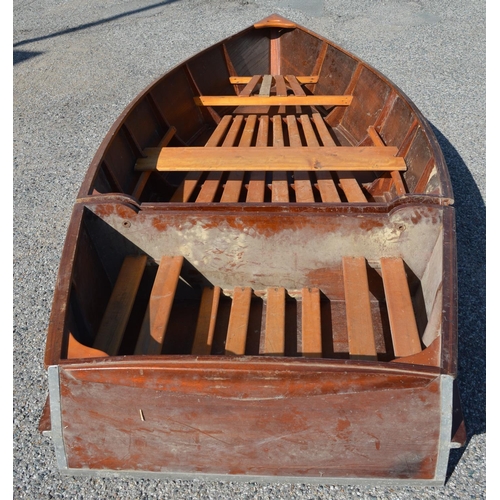 254 - An all wood portable dinghy in two parts, the larger bow section goes on the roof rack, the stern in... 