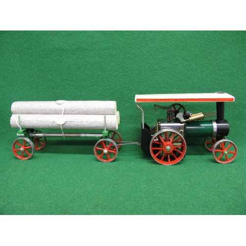 261 - Boxed Mamod steam tractor and lumber wagon, includes steering column, funnel, instructions, some spa... 