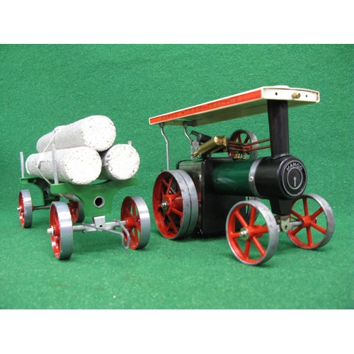 261 - Boxed Mamod steam tractor and lumber wagon, includes steering column, funnel, instructions, some spa... 