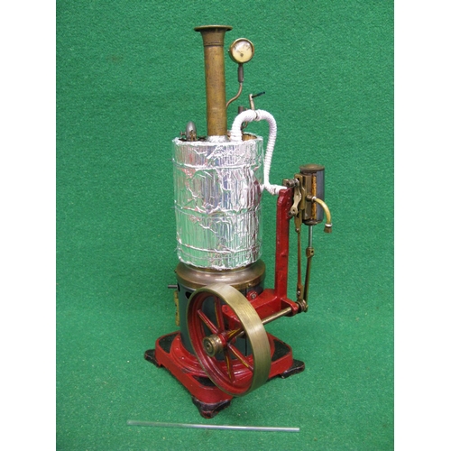 270 - Modified single cylinder vertical steam engine attached to a vertical boiler on a cast iron base emb... 