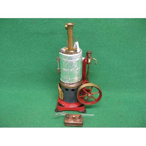 270 - Modified single cylinder vertical steam engine attached to a vertical boiler on a cast iron base emb... 