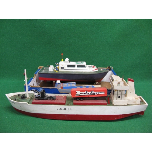 279 - Three model boats with electric motors, all in need of a re-fit.  Cargo vessel - 30.5