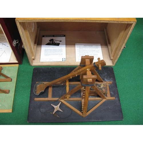 308 - Two cased educational working models of a trebuchet and ballista.  Both need minor repairs and are m... 