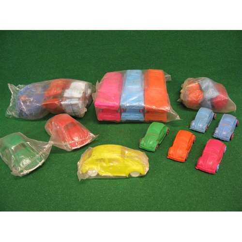 316 - Quantity of lesser quality all plastic toy VW Beetles (three sizes) and estate cars, some in trade p... 