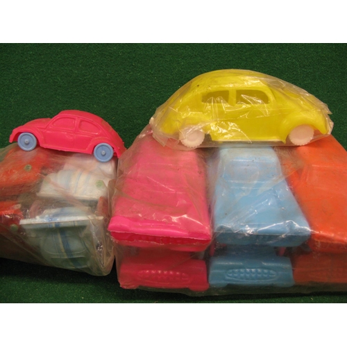 316 - Quantity of lesser quality all plastic toy VW Beetles (three sizes) and estate cars, some in trade p... 