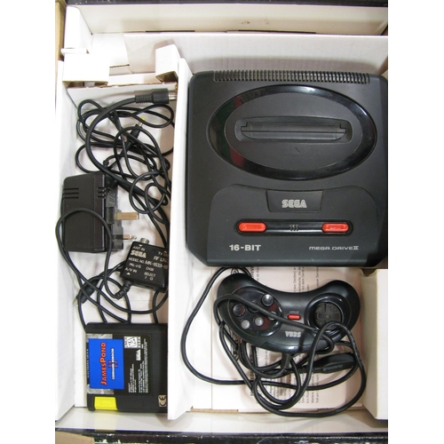 319 - Boxed Sega Mega Drive II from the early 1990's together with a James Pond II cartridge (untested)