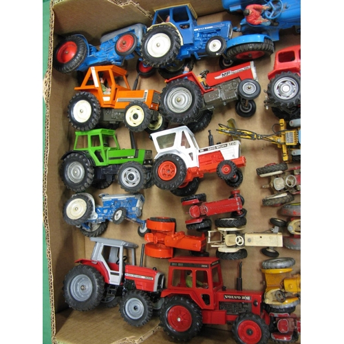 343 - Box of approx thirty seven loose playworn tractor and implement models of various scales by Dinky, B... 