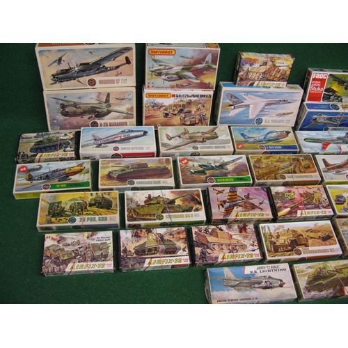 377 - Thirty three boxed unmade plastic kits of aircraft and military vehicles produced by Airfix, Matchbo... 