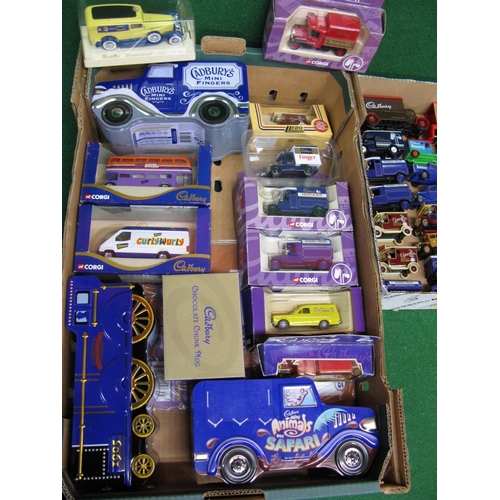 380 - Collection of approx thirty five Cadbury's Chocolate liveried vehicle and tin collection from Corgi,... 