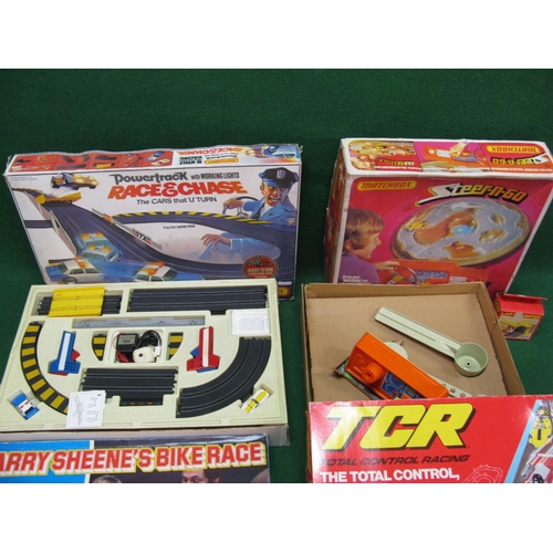 382 - Group of four racing or driving based games to comprise: Matchbox Steer-n-go, Matchbox Powertrack Ra... 