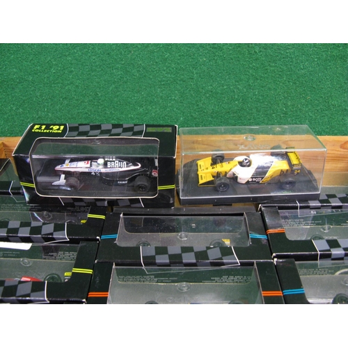 403 - Thirty seven boxed Onyx (Portugal) 1:43 scale F1 racing cars.  Includes duplicates/multiples