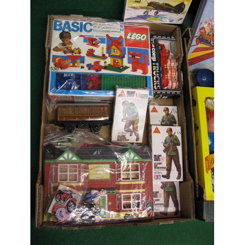 404 - Two boxes of miscellaneous toys to include: Rivarossi locomotive, Pelham puppet of Old Lady, Meccano... 