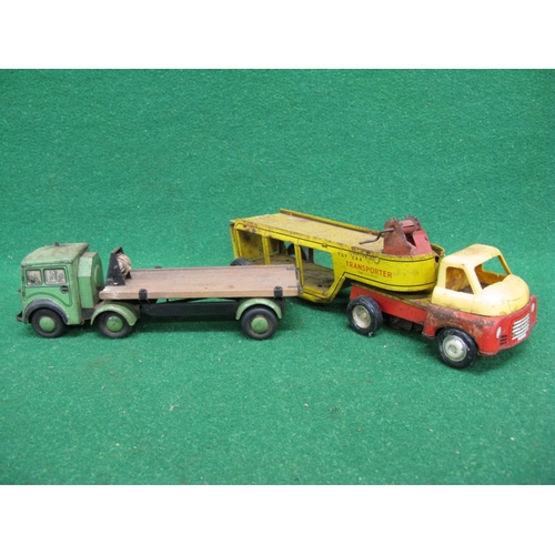 445 - Loft find clockwork tinplate and plastic Toy Car Transporter in lined yellow and red livery with win... 