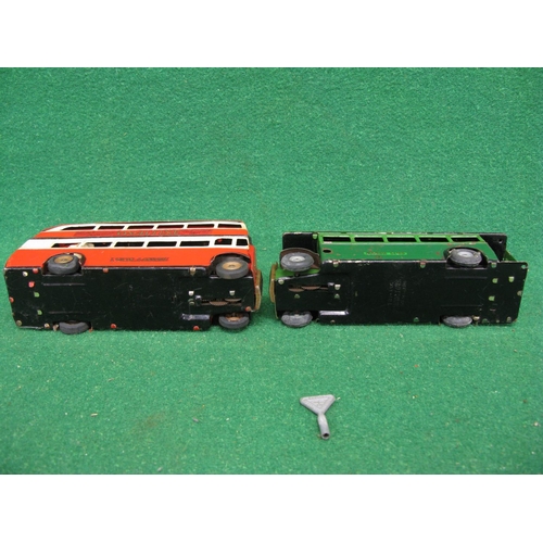 446 - Two 1940's/1950's unboxed loft find Minic tinplate clockwork buses to comprise: single deck Greenlin... 