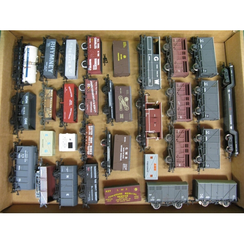 476 - Twenty six loose playworn OO scale Bachmann and Dapol etc Goods wagons and Guards vans together with... 